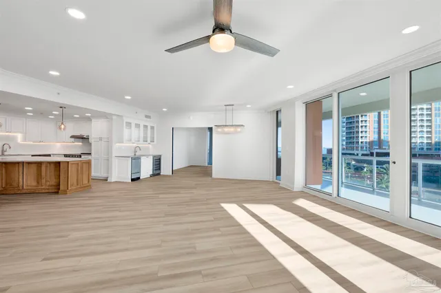 a view of a livingroom with furniture and wooden floor