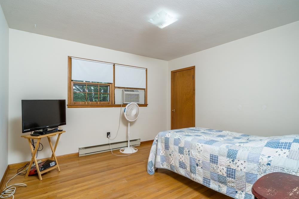 289 Pleasant View Road Staunton, VA 24401 - Photo 12 of 45 a bedroom with a bed and a flat screen tv