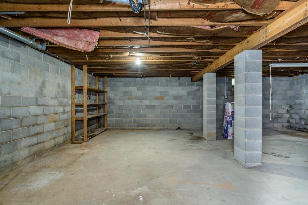 289 Pleasant View Road Staunton, VA 24401 - Photo 17 of 45 a view of an empty room with a brick wall