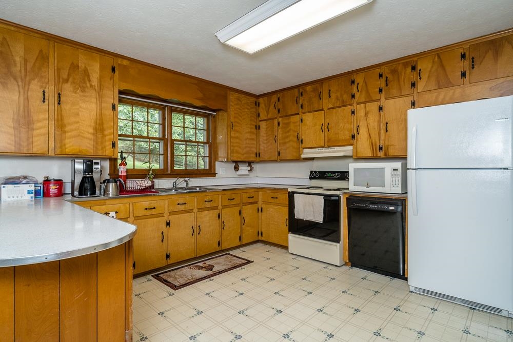 289 Pleasant View Road Staunton, VA 24401 - Photo 3 of 45 a kitchen with stainless steel appliances granite countertop a stove a sink a refrigerator and island