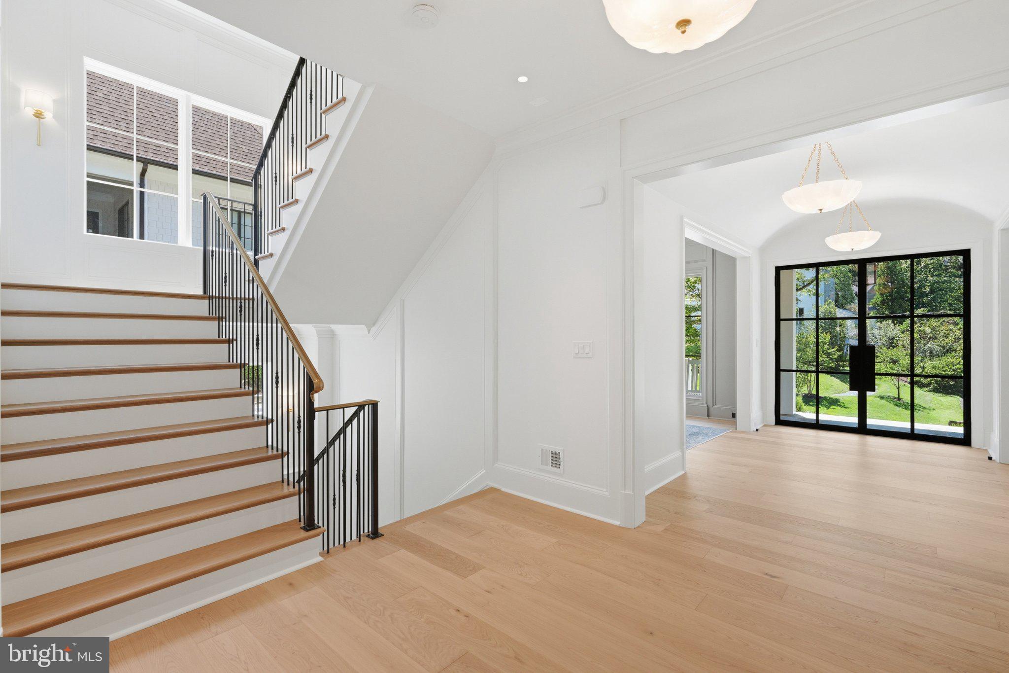 6008 Oakdale Road McLean, VA 22101 - Photo 12 of 111 Elegant entryway with modern staircase.