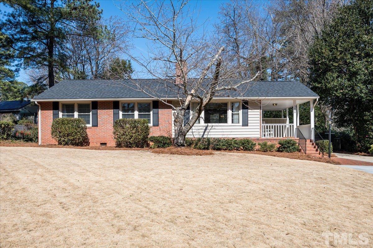 3426 Redbud Lane Raleigh, NC 27607 - Photo 1 of 30 front view of a house with a yard