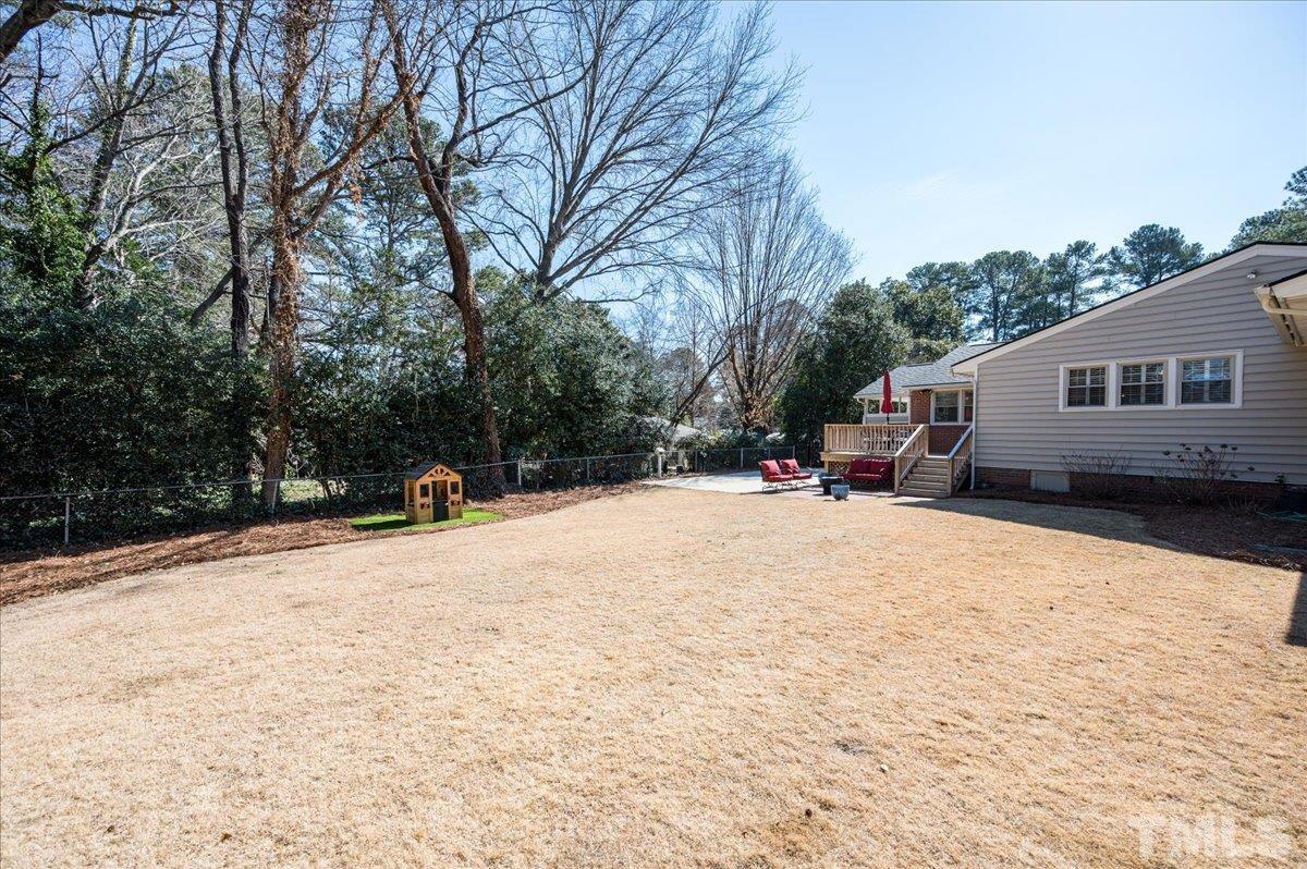 3426 Redbud Lane Raleigh, NC 27607 - Photo 28 of 30 a view of outdoor space yard and house