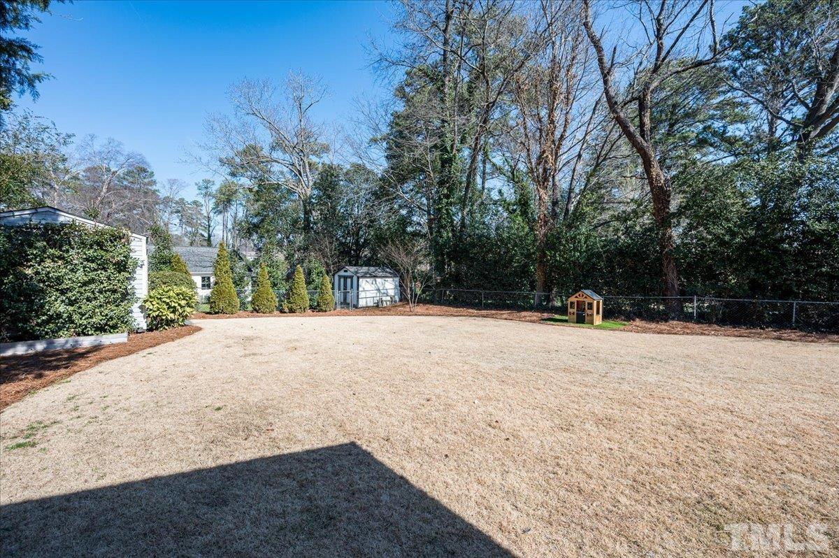 3426 Redbud Lane Raleigh, NC 27607 - Photo 29 of 30 a view of outdoor space with trees