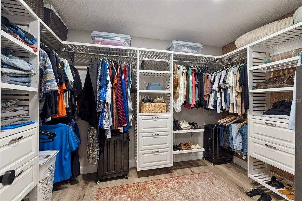 1908 Poppy Lane Port Orange, FL 32128 - Photo 15 of 43 a view of walk in closet with clothes and shoes
