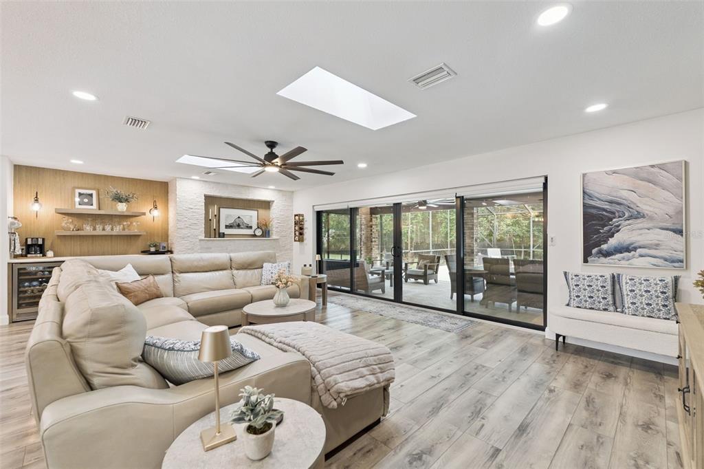 1908 Poppy Lane Port Orange, FL 32128 - Photo 17 of 43 a living room with furniture and a large window with outer view