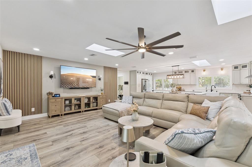 1908 Poppy Lane Port Orange, FL 32128 - Photo 18 of 43 a living room with furniture and a flat screen tv