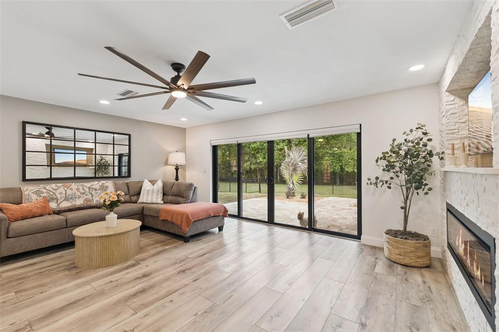 1908 Poppy Lane Port Orange, FL 32128 - Photo 23 of 43 a living room with furniture and a large window