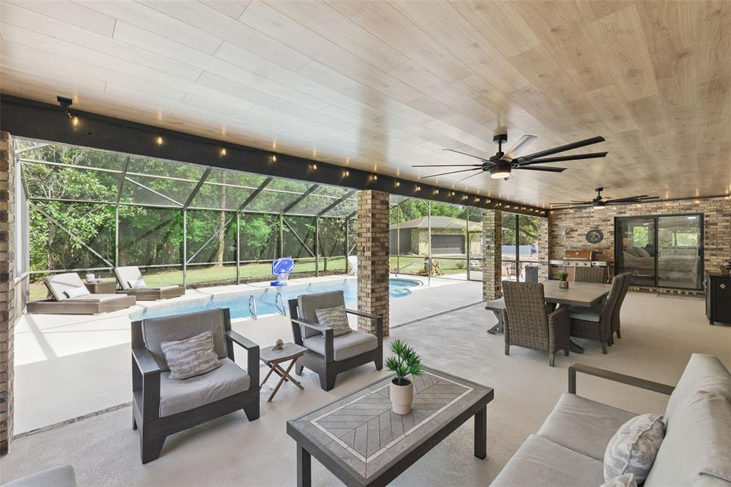1908 Poppy Lane Port Orange, FL 32128 - Photo 27 of 43 a living room with furniture and a large window