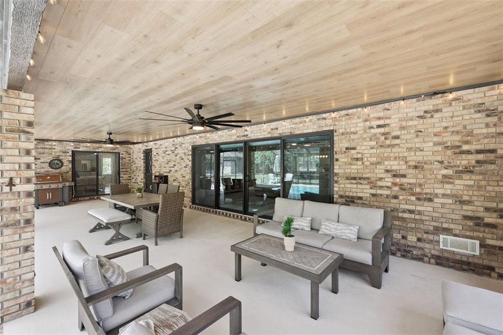 1908 Poppy Lane Port Orange, FL 32128 - Photo 28 of 43 a building outdoor space with patio furniture