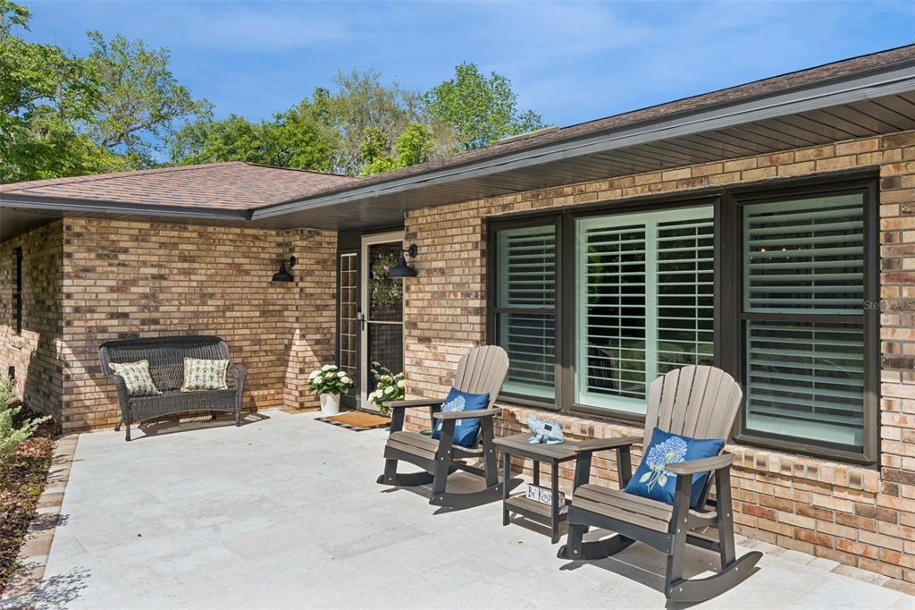 1908 Poppy Lane Port Orange, FL 32128 - Photo 3 of 43 a view of two chairs in the patio