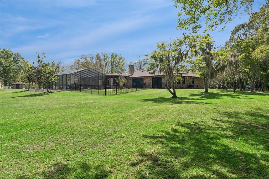 1908 Poppy Lane Port Orange, FL 32128 - Photo 38 of 43 a park with lots of trees