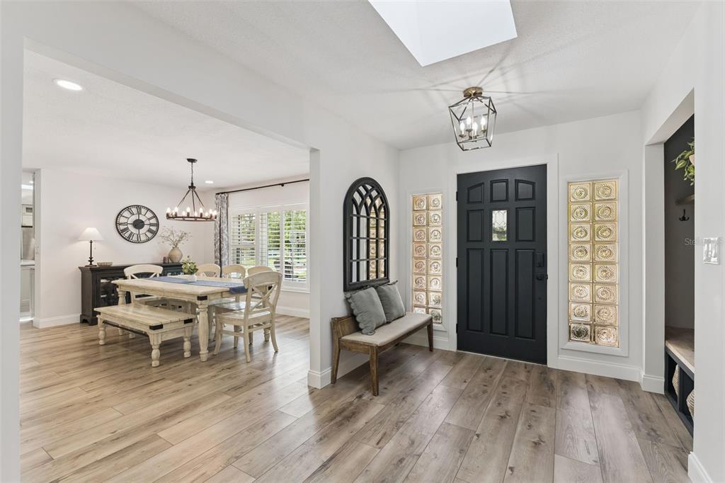 1908 Poppy Lane Port Orange, FL 32128 - Photo 5 of 43 a view of a dining room with furniture window and wooden floor