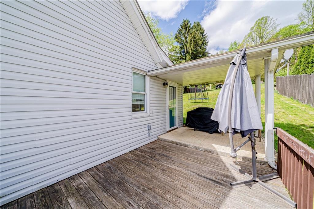 135 Elrico Road Slickville, PA 15684 - Photo 2 of 22 a view of a backyard with a patio