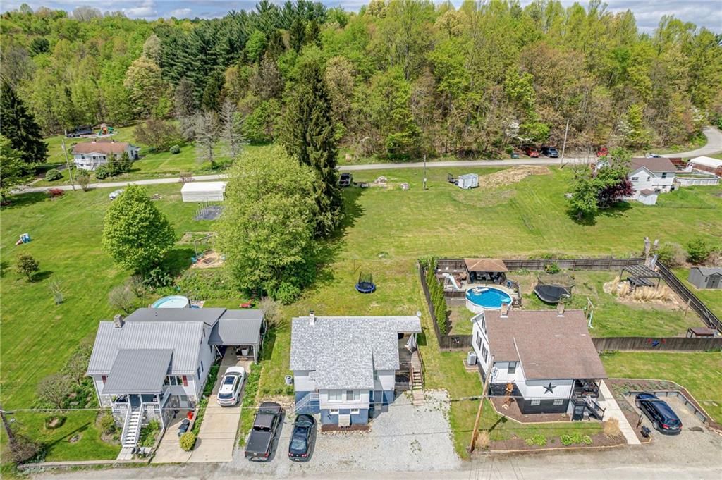 135 Elrico Road Slickville, PA 15684 - Photo 21 of 22 an aerial view of a house with a yard