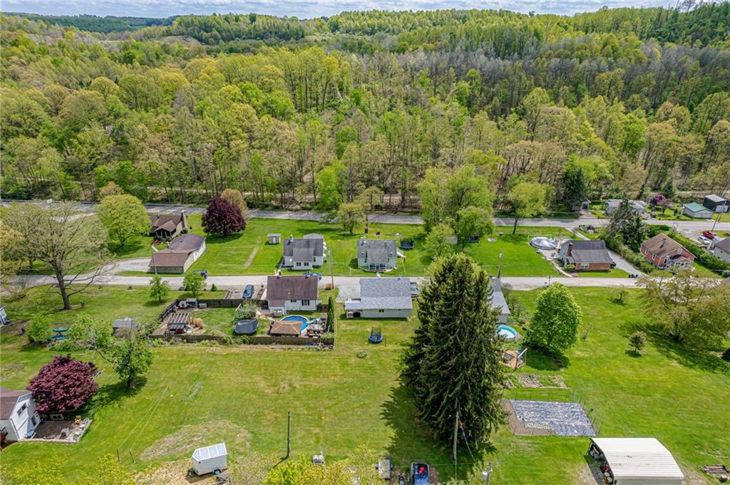 135 Elrico Road Slickville, PA 15684 - Photo 22 of 22 a view of a house with a garden