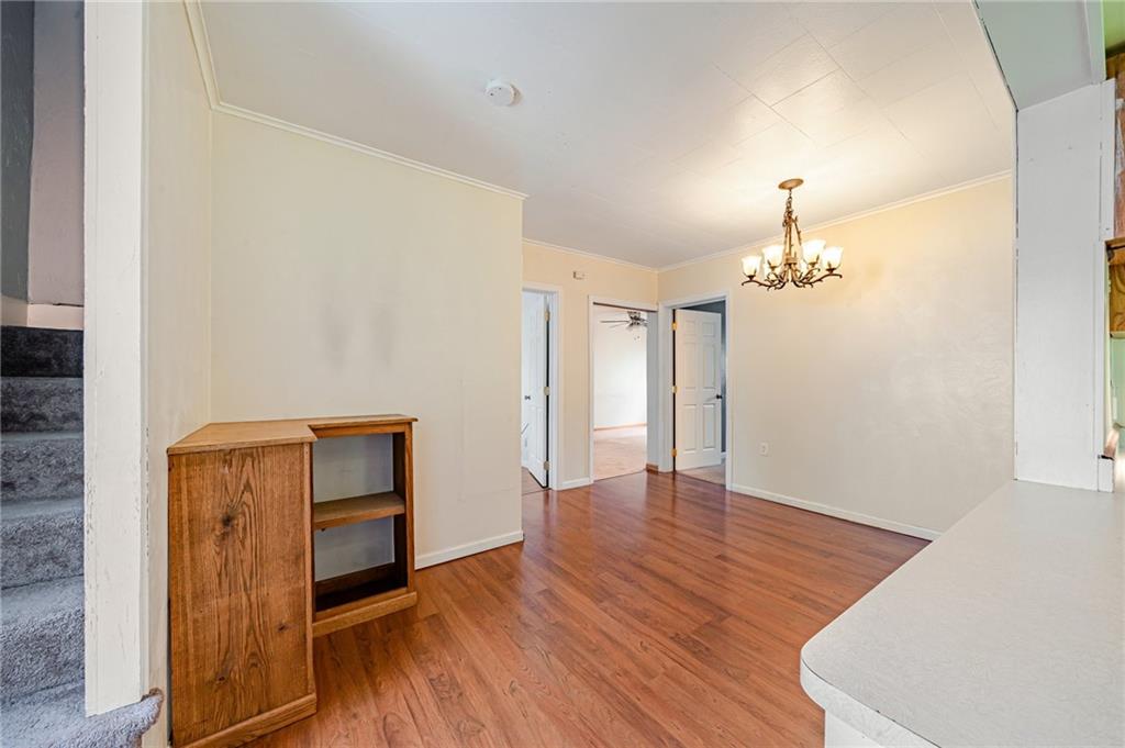 135 Elrico Road Slickville, PA 15684 - Photo 9 of 22 a view of empty room with wooden floor