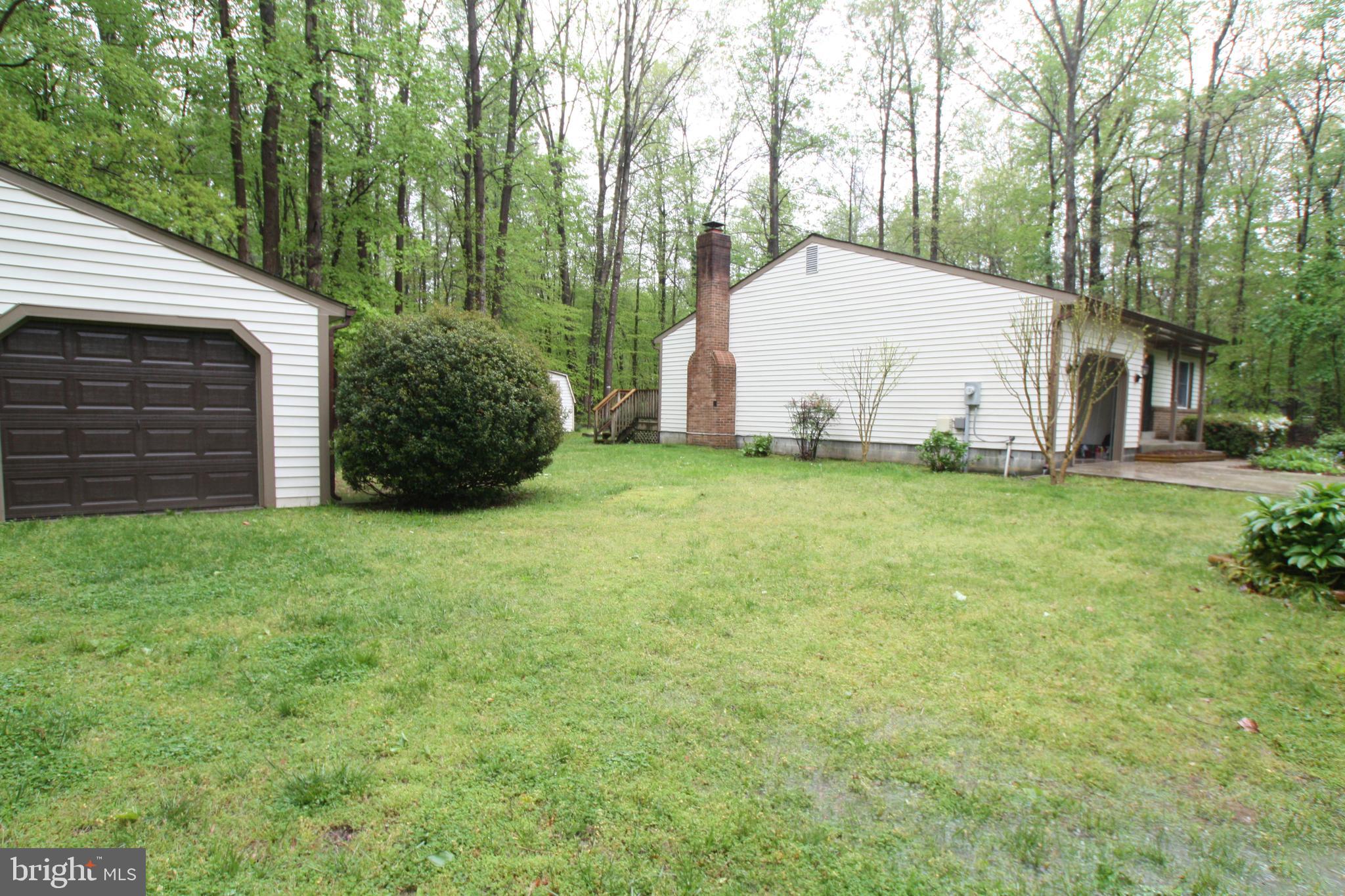 9301 Merkel Farms Road Bowie, MD 20715 - Photo 3 of 22 Side of house with detached