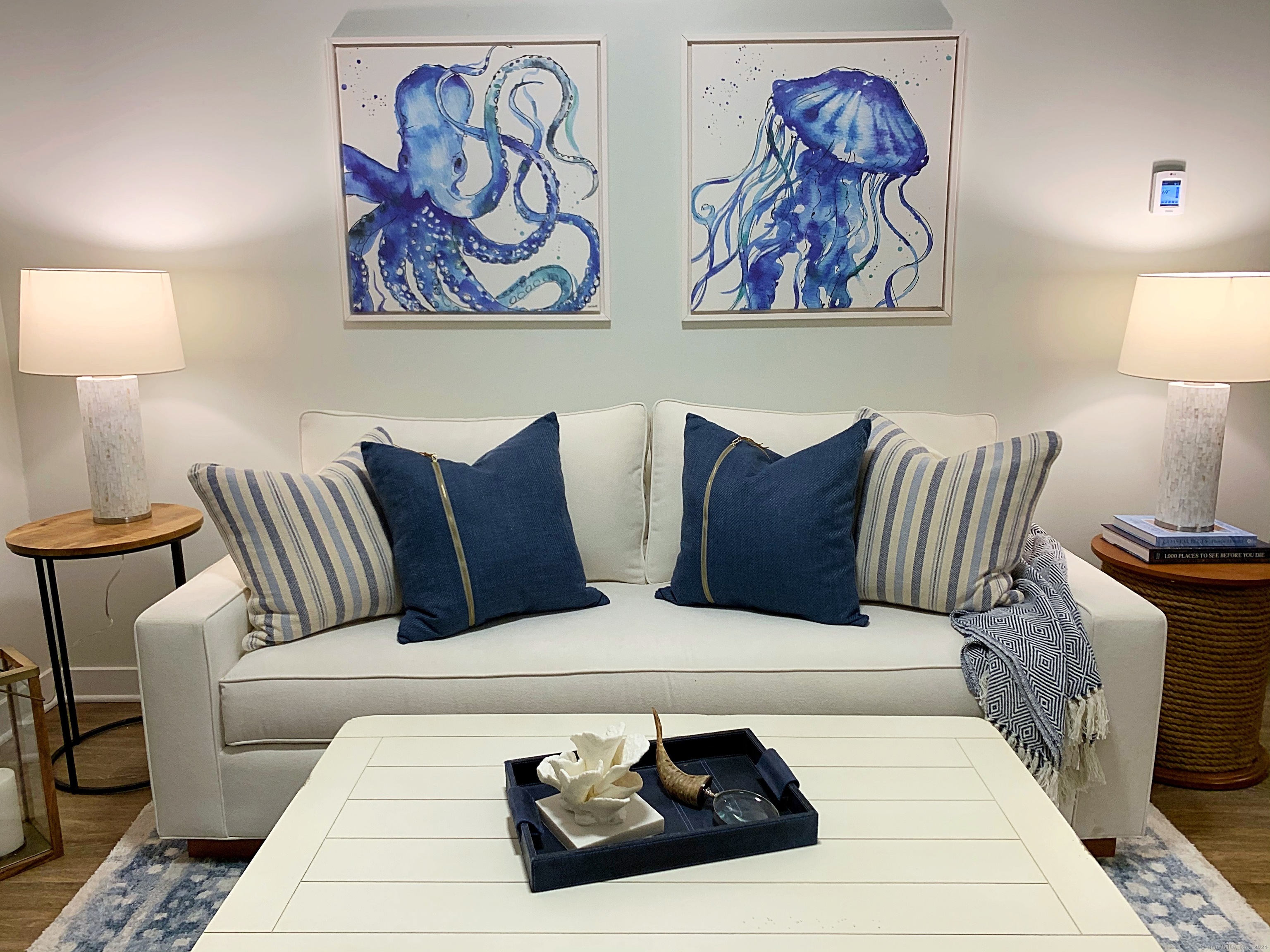 50 Perkins Farm Drive, Unit PH402 NEWPORT Stonington, CT 06355 - Photo 15 of 31 a living room with furniture and wall painting