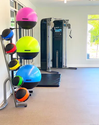 a kitchen with a sink a stove and refrigerator