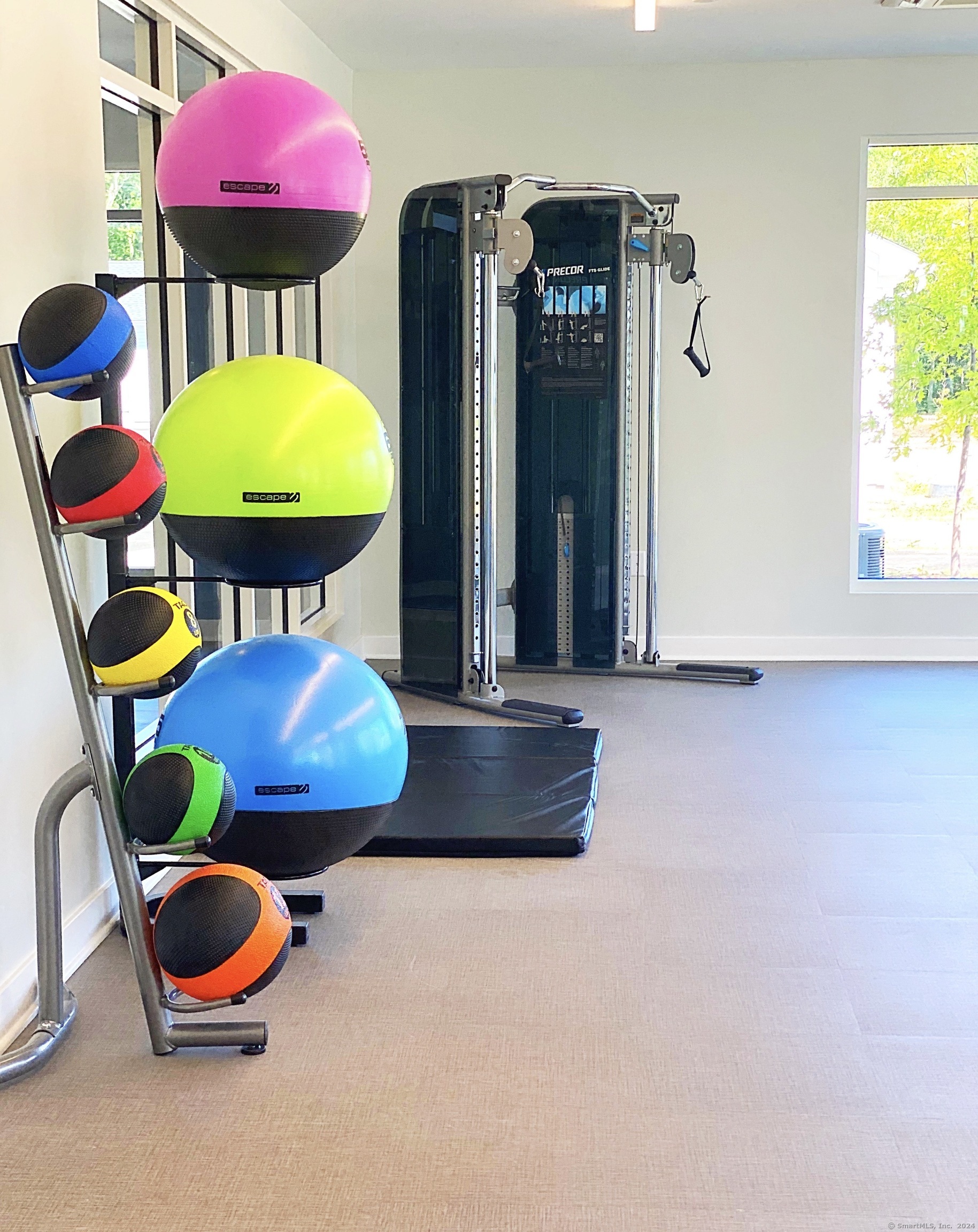 50 Perkins Farm Drive, Unit PH402 NEWPORT Stonington, CT 06355 - Photo 9 of 31 a view of a room with shelves and wooden floor