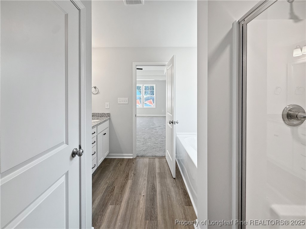 342 Flying Bolt Drive Raeford, NC 28376 - Photo 18 of 30 a view of a bathroom from a hallway