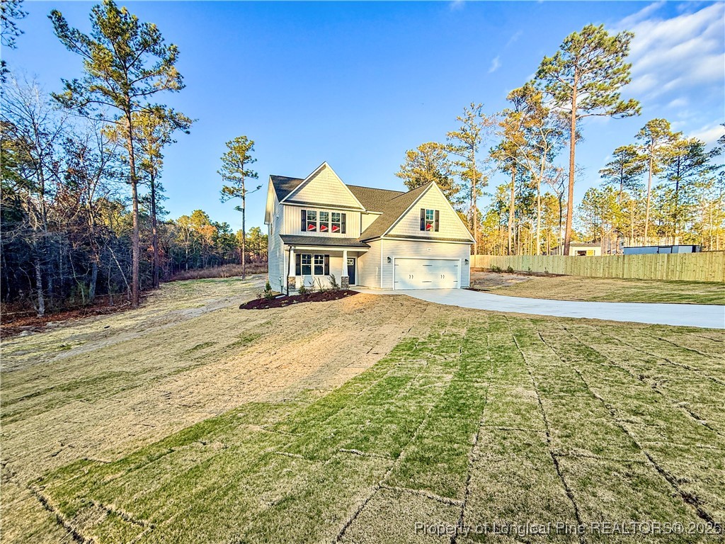 342 Flying Bolt Drive Raeford, NC 28376 - Photo 2 of 30 a view of a house with a yard