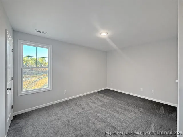 an empty room with window