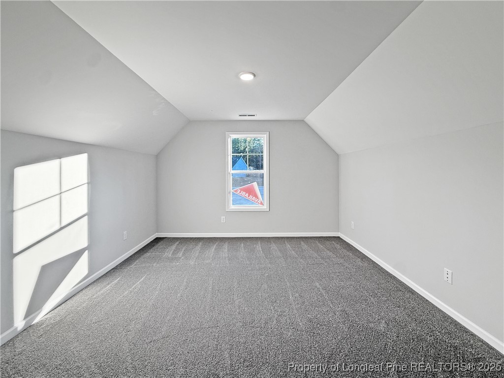 342 Flying Bolt Drive Raeford, NC 28376 - Photo 23 of 30 an empty room with windows