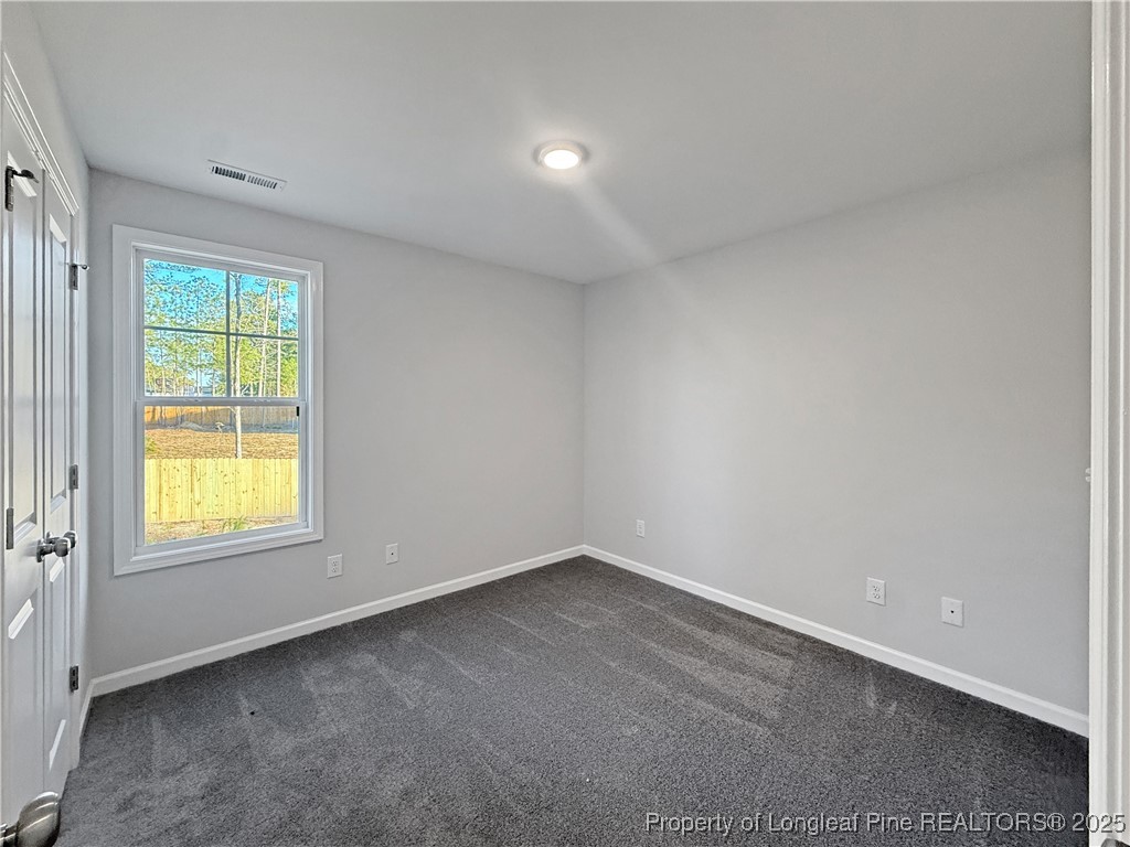 342 Flying Bolt Drive Raeford, NC 28376 - Photo 27 of 30 an empty room with a window