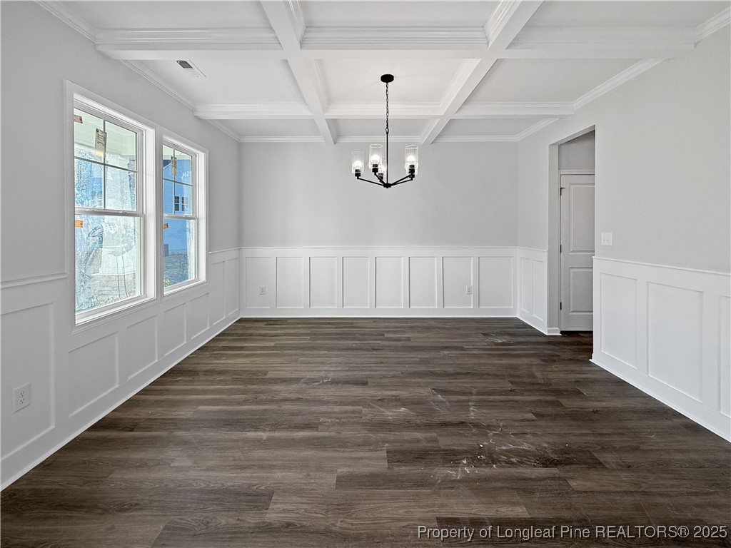 342 Flying Bolt Drive Raeford, NC 28376 - Photo 5 of 30 a view of an empty room with wooden floor and window
