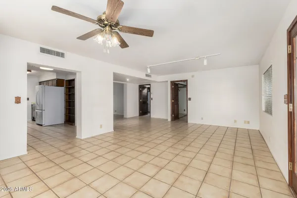a bathroom with a shower and a sink
