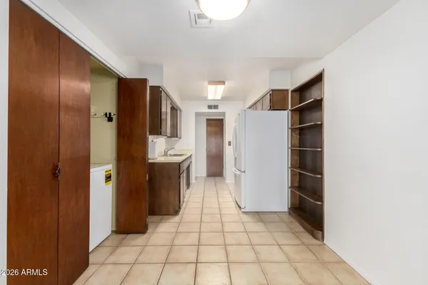 a bathroom with a sink a mirror and a bathtub