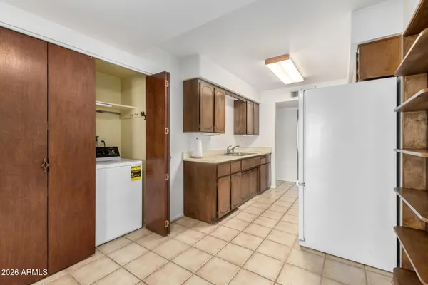 a utility room with washer and dryer