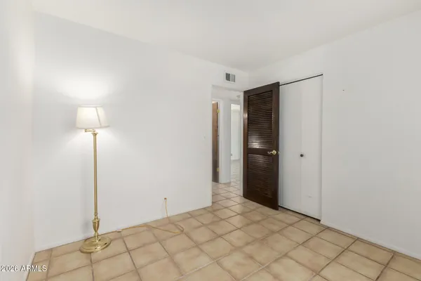 a view of a room that has a window in it