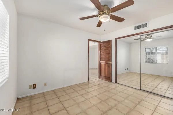 a view of a room with windows