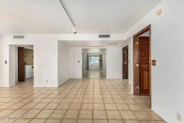 a view of an empty room and window