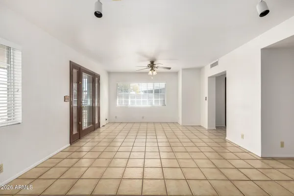 a view of an empty room and window
