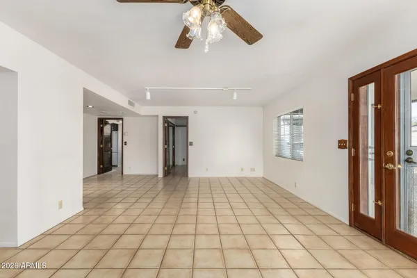 a view of an empty room and window