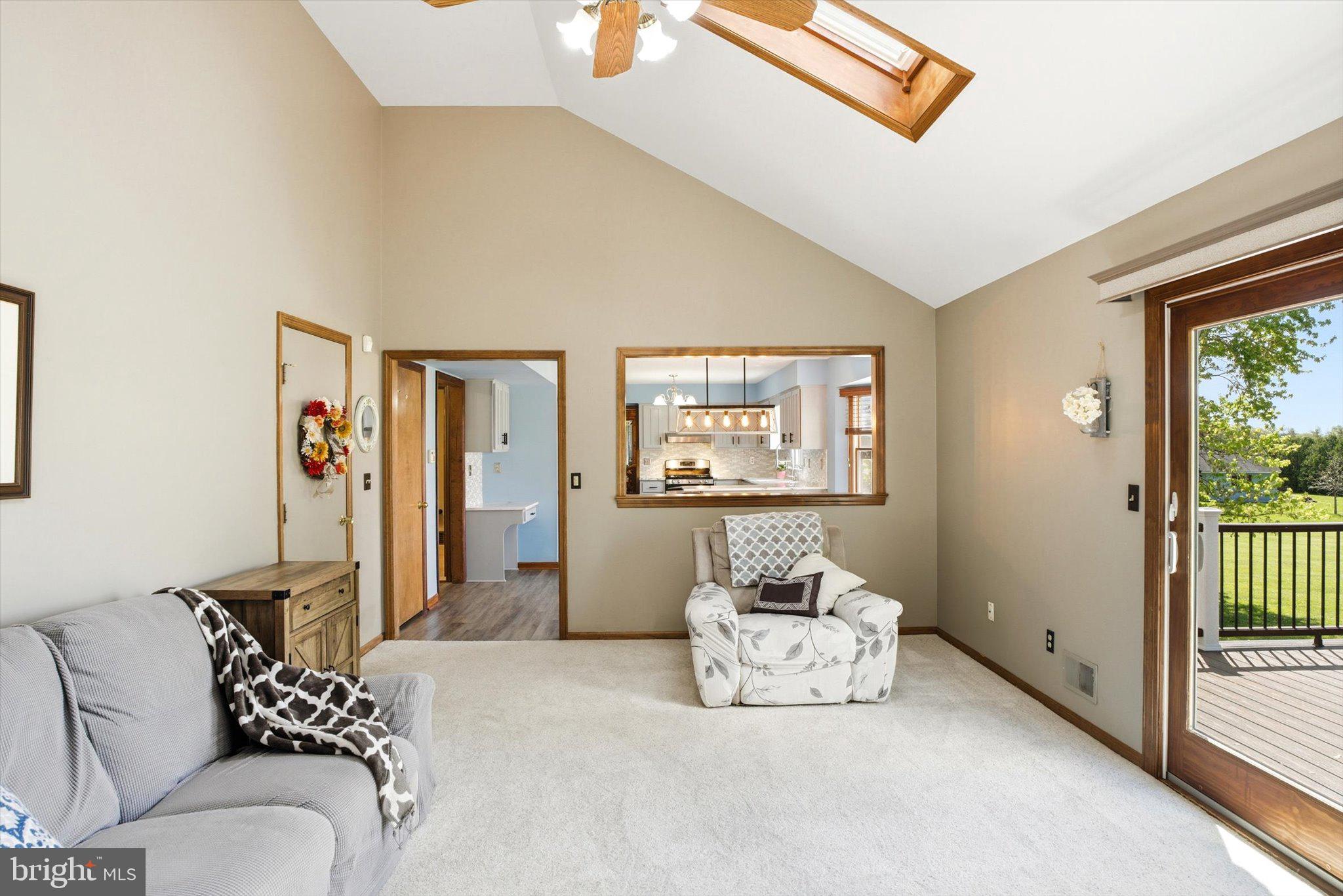 25446 Mt Pleasant Road Columbus, NJ 08022 - Photo 12 of 32 a spacious bedroom with a bed and a couch