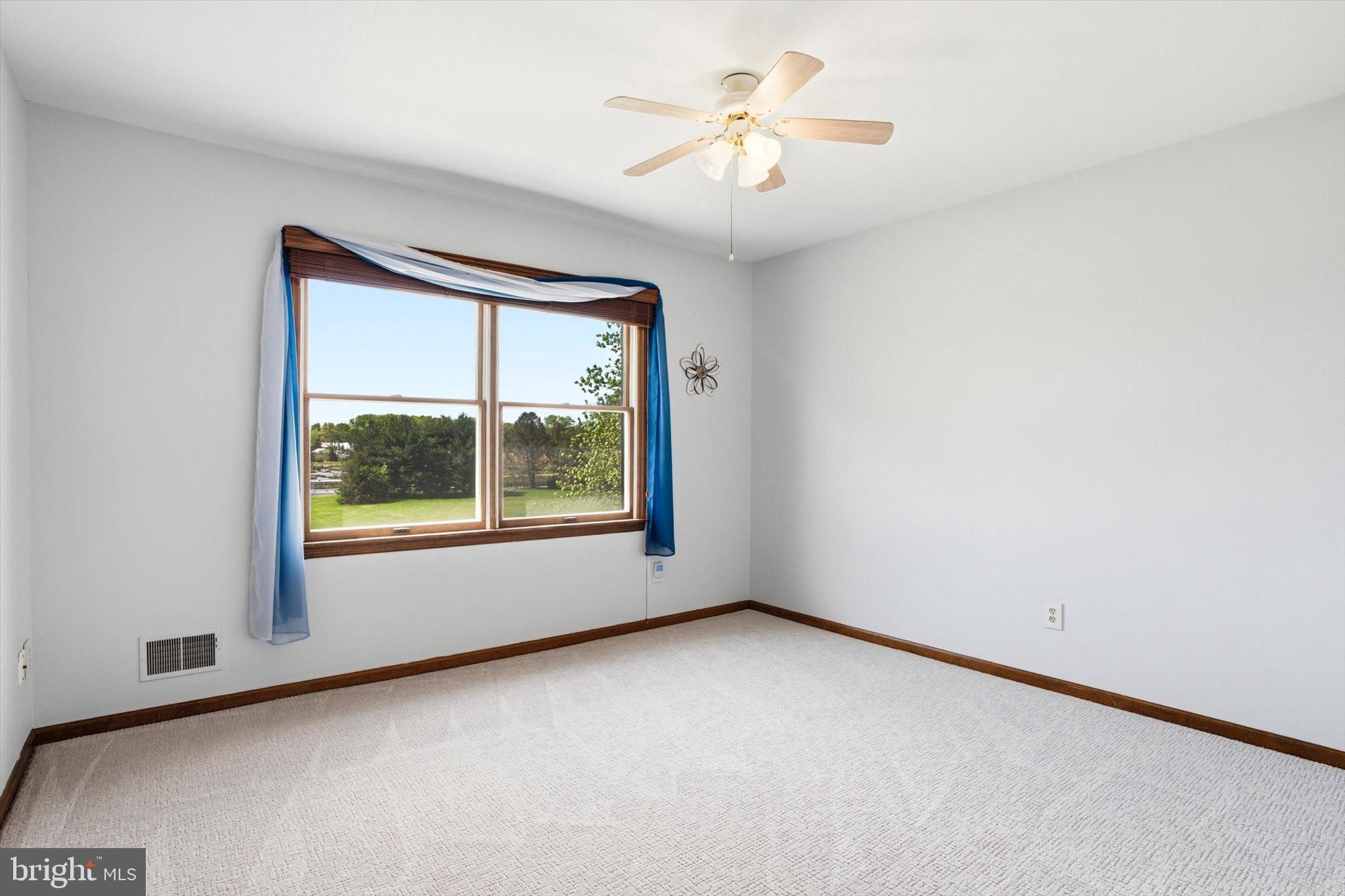 25446 Mt Pleasant Road Columbus, NJ 08022 - Photo 17 of 32 an empty room with a window