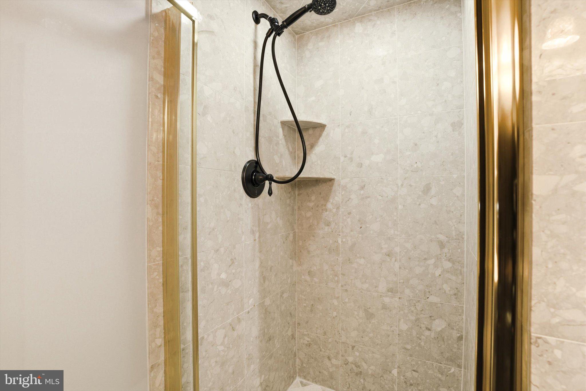 25446 Mt Pleasant Road Columbus, NJ 08022 - Photo 10 of 32 a bathroom with a glass shower door