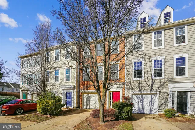 a front view of a building with street view