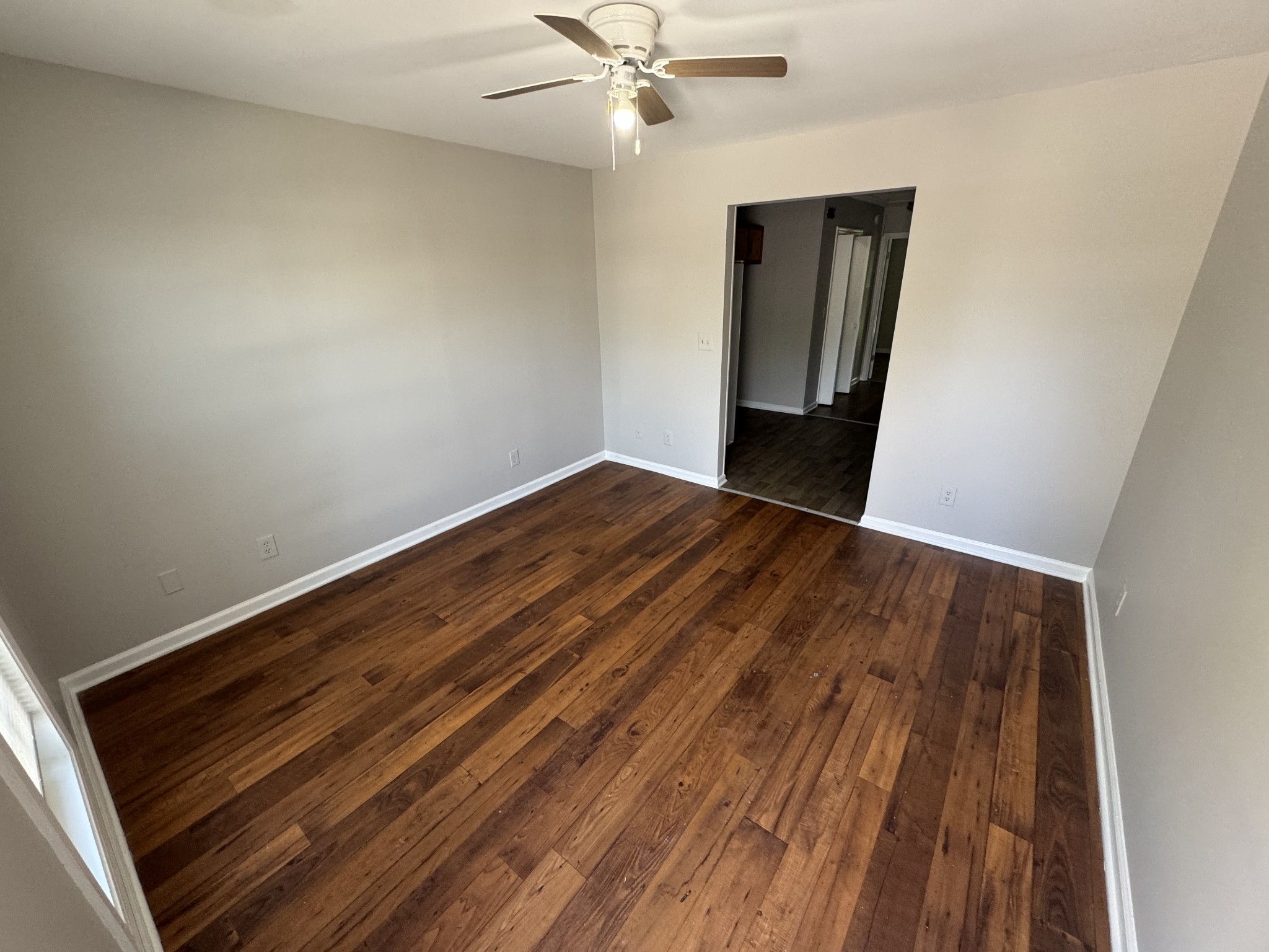 1321 Dudley Street, Unit 11 Murfreesboro, TN 37130 - Photo 1 of 4 wooden floor in an empty room