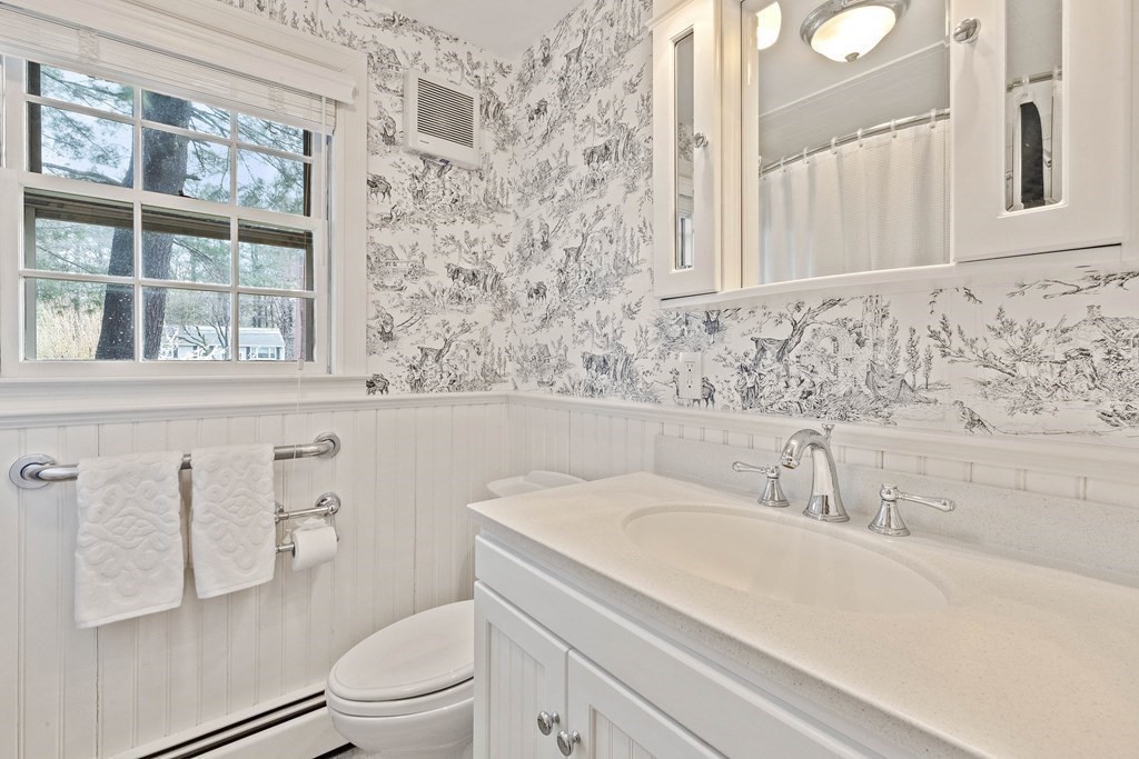 29 Taft Avenue Beverly, MA 01915 - Photo 17 of 41 a bathroom with a sink and a toilet