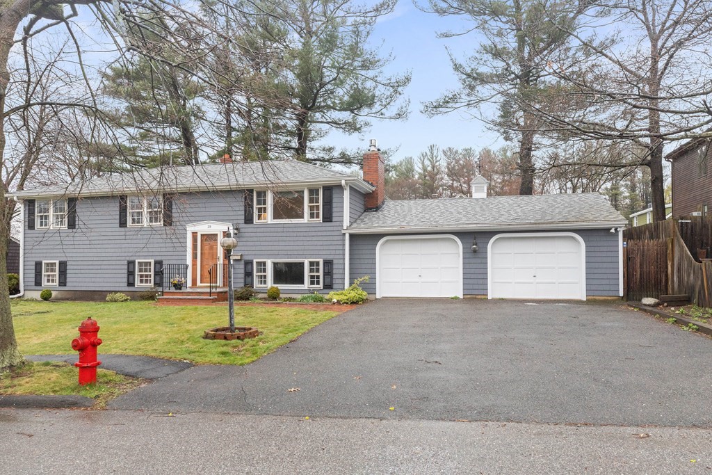 29 Taft Avenue Beverly, MA 01915 - Photo 2 of 41 a front view of house with yard and trees in the background