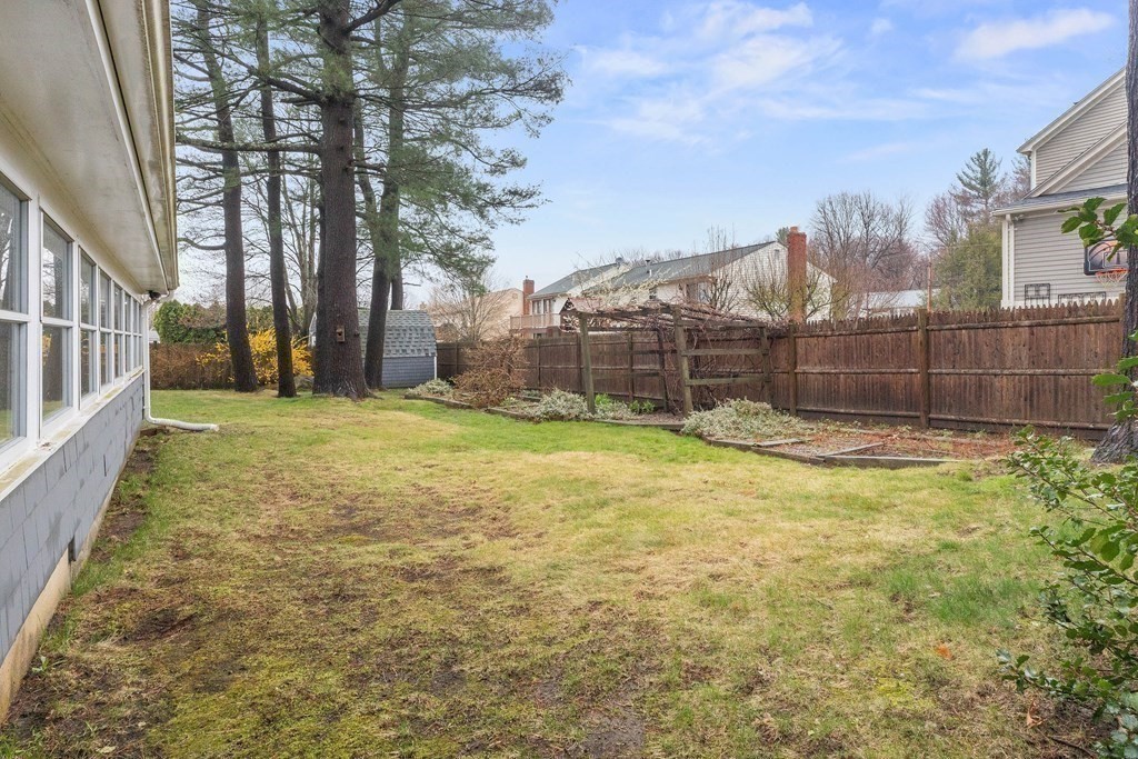 29 Taft Avenue Beverly, MA 01915 - Photo 37 of 41 a view of a backyard with large trees