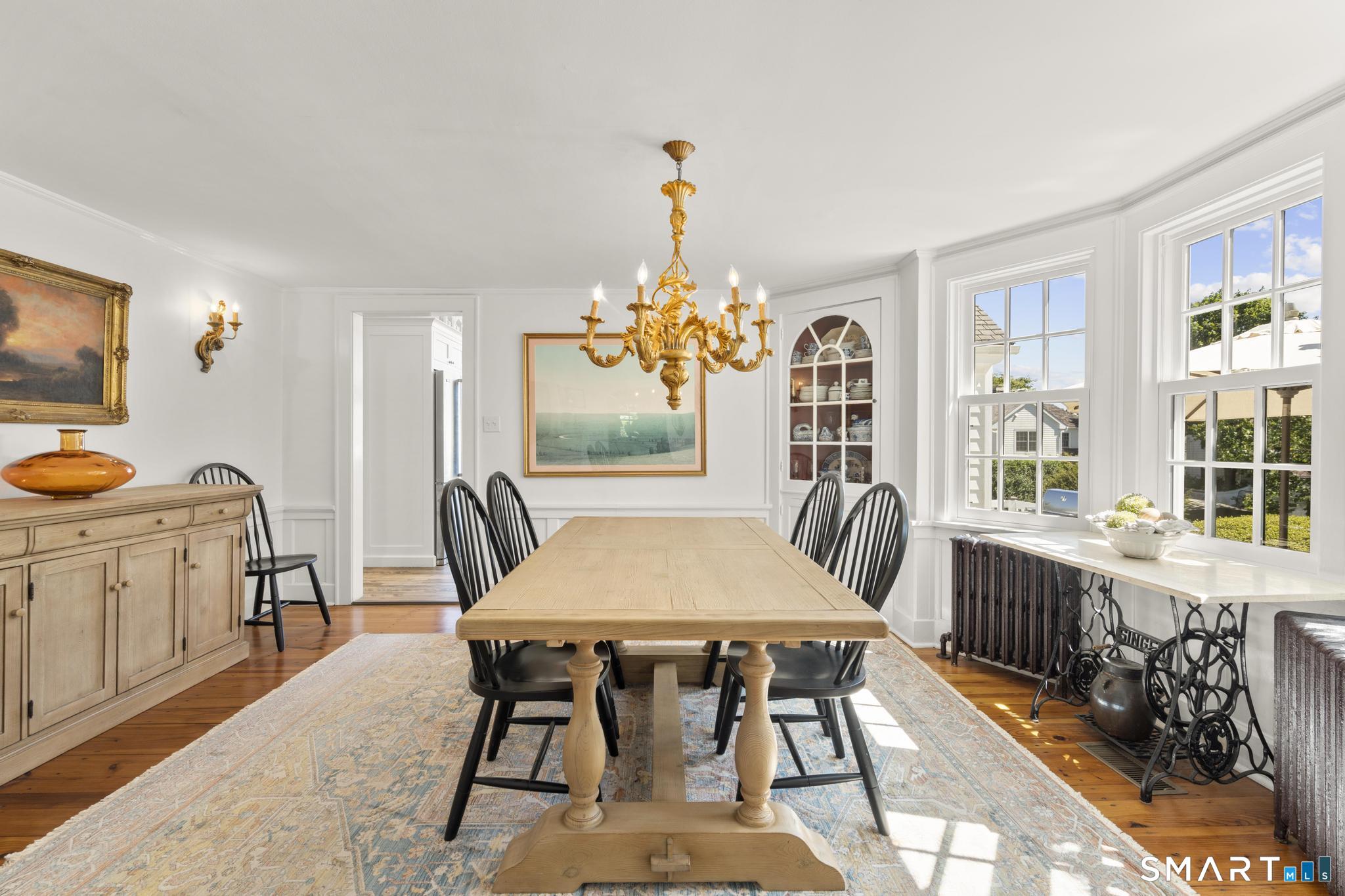 394 Wakeman Road Fairfield, CT 06824 - Photo 8 of 40 Formal Dining Room with raised panels and built-in corner cabinetry.