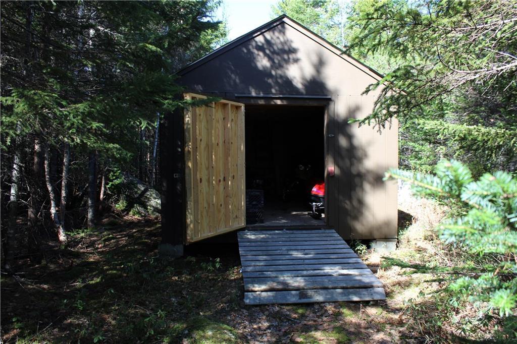 62 Ledge View Road West Forks, ME 04985 - Photo 8 of 33 Back side of storage garage