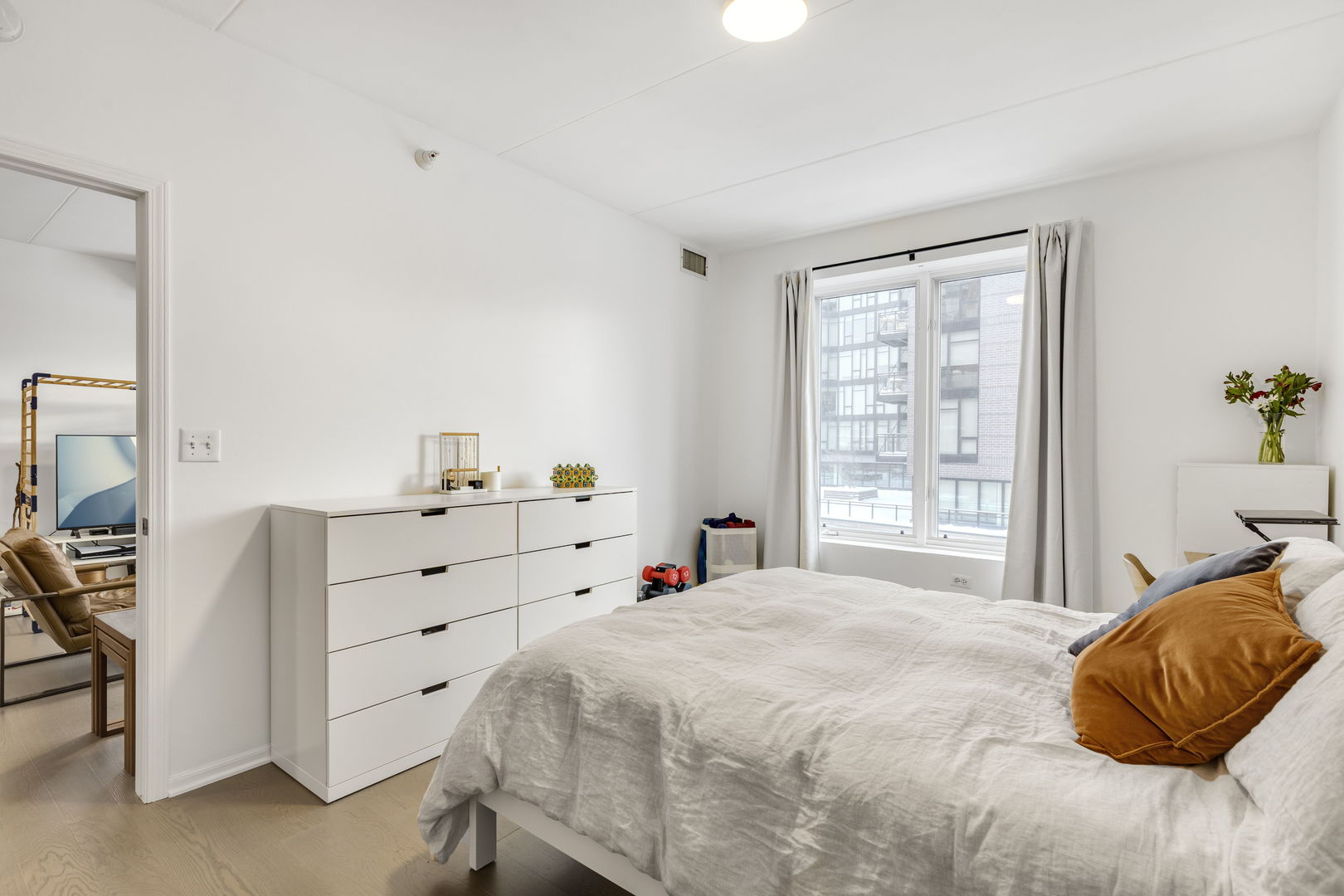 515 Main Street, Unit 308 Evanston, IL 60202 - Photo 11 of 19 a bedroom with a bed and window
